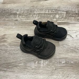 Infant black Nikes size 6c